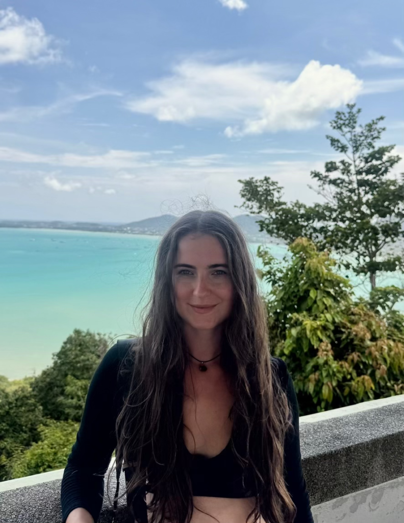 Qendresa posing with a beautiful view of Thailand seas